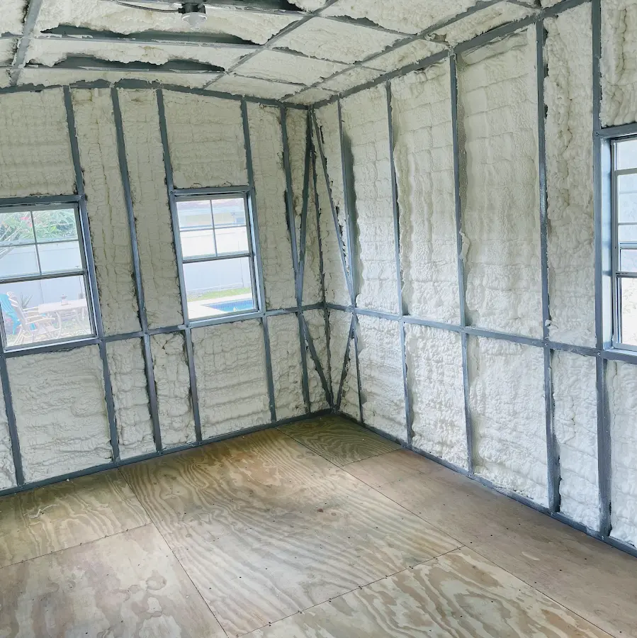 Closed-cell spray foam insulation applied to wall cavities in a residential project in Mayo